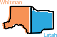 A graphic outline of Whitman and Latah County borders, with Whitman County in orange and Latah County in blue, with the words: Whitman and Latah.