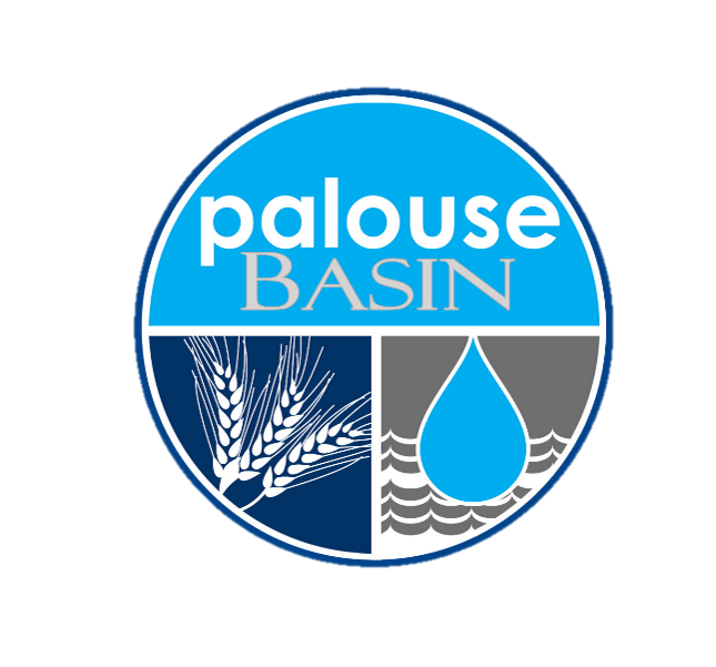 Palouse Basin Water Summit logo, which is a circle with a light blue top half with the words "Palouse Basin" and the bottom half separated in two with a dark blue side with a white wheat silhoutte, and a gray side with water waves and a blue water drop.
